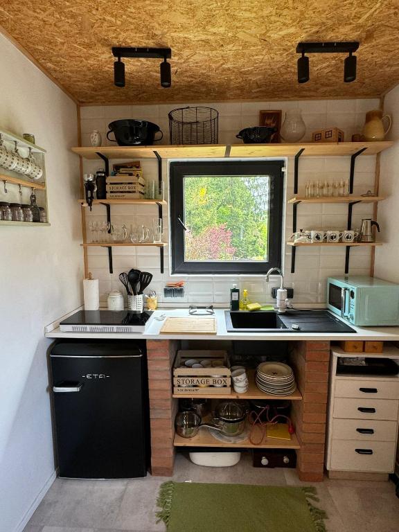Kuchyň nebo kuchyňský kout v ubytování Tiny Home Kontík