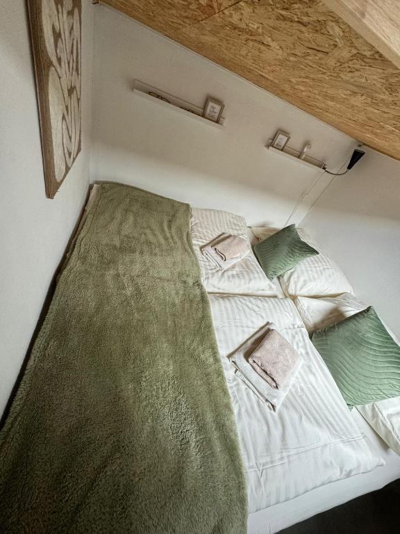 Postel nebo postele na pokoji v ubytování Tiny Home Kontík
