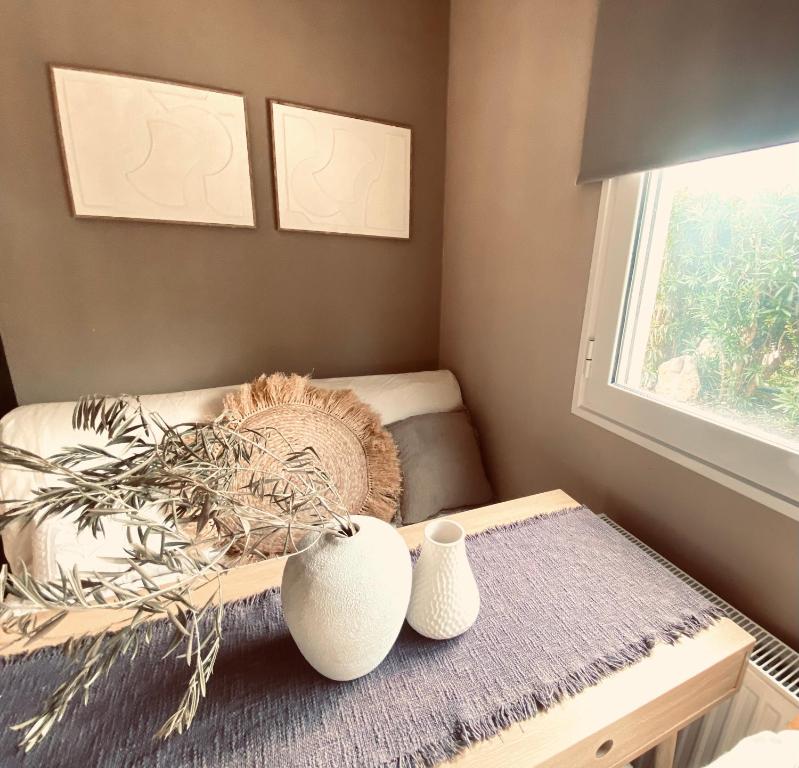 Postel nebo postele na pokoji v ubytování KIPOS-SS residences