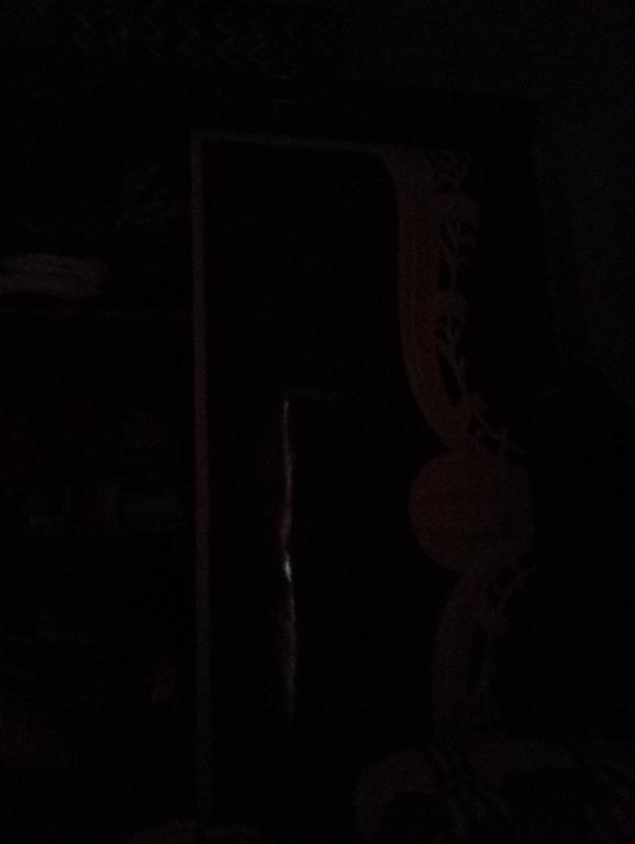 a dark room with a window in the dark at السقالة ميدان اكا in Hurghada