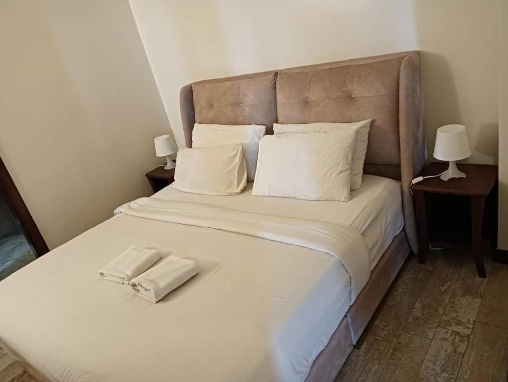 Postel nebo postele na pokoji v ubytování Bintang Lux B&B Suites Times Square KL