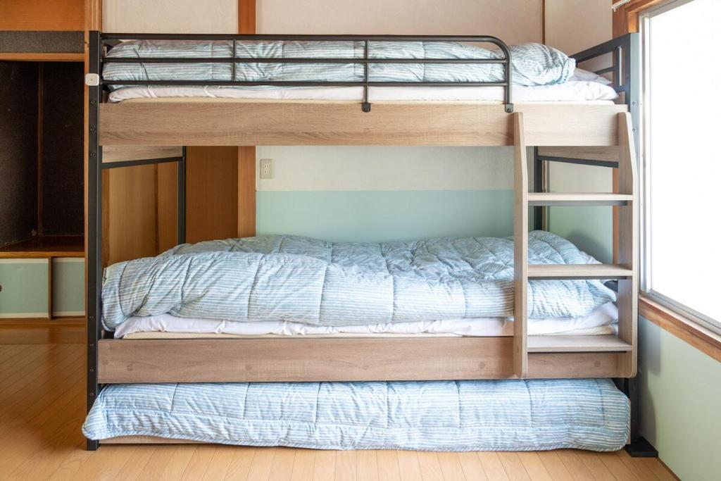 Postel nebo postele na pokoji v ubytování GREAT VACATION