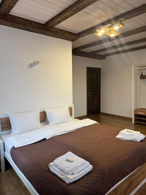 Postel nebo postele na pokoji v ubytování Kolos house