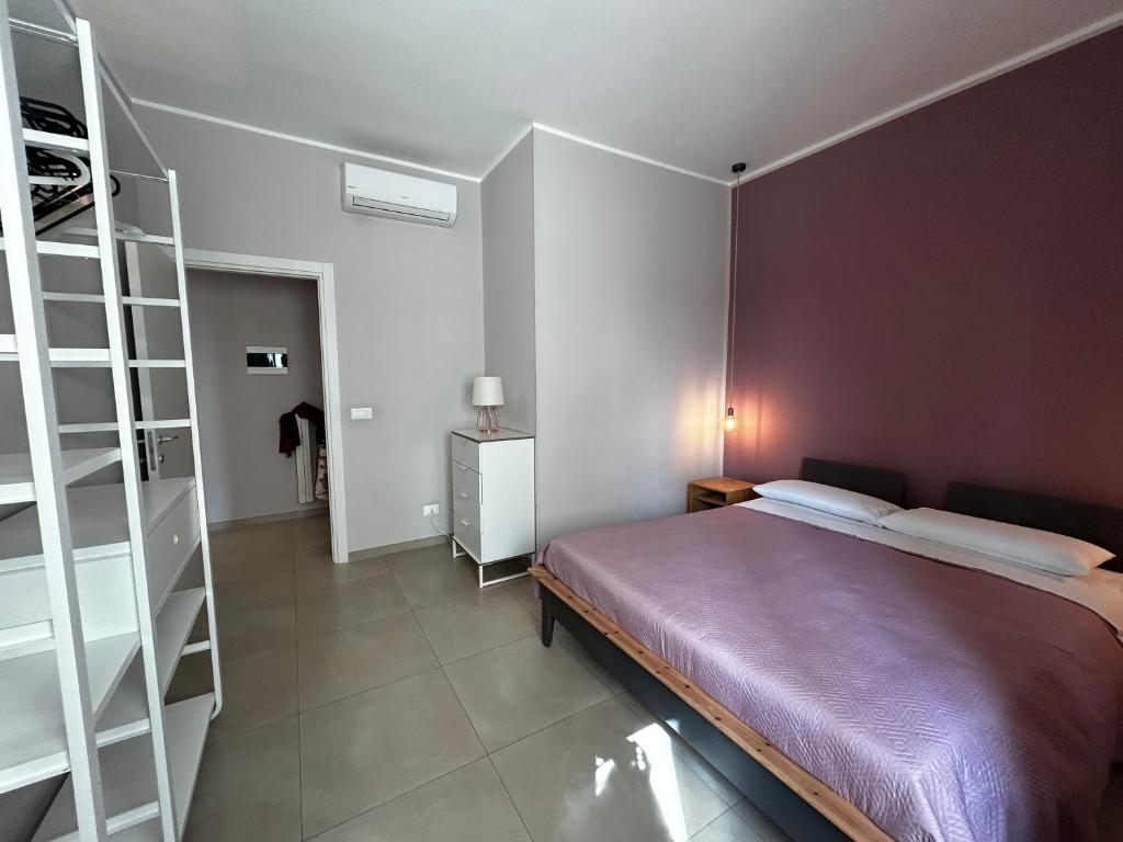 Łóżko lub łóżka w pokoju w obiekcie Apartment Antonella