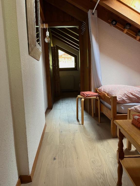 Postel nebo postele na pokoji v ubytování Chalet Les Rhodos appartement le Yeti