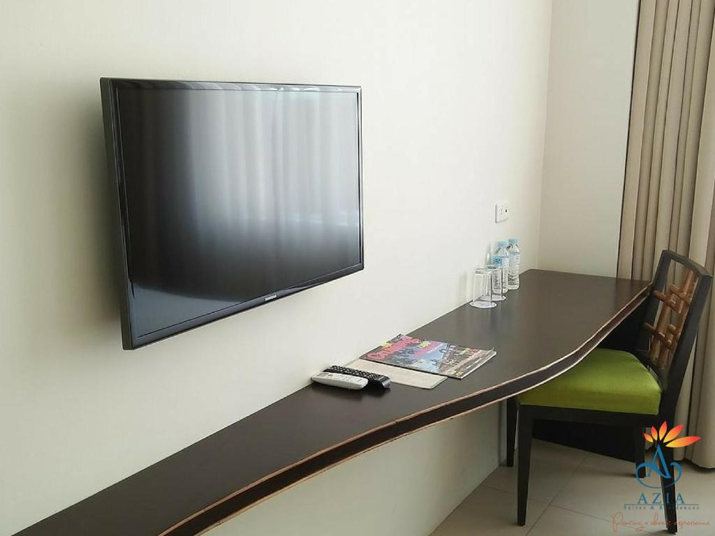 TV a/nebo společenská místnost v ubytování Azia Suites and Residences
