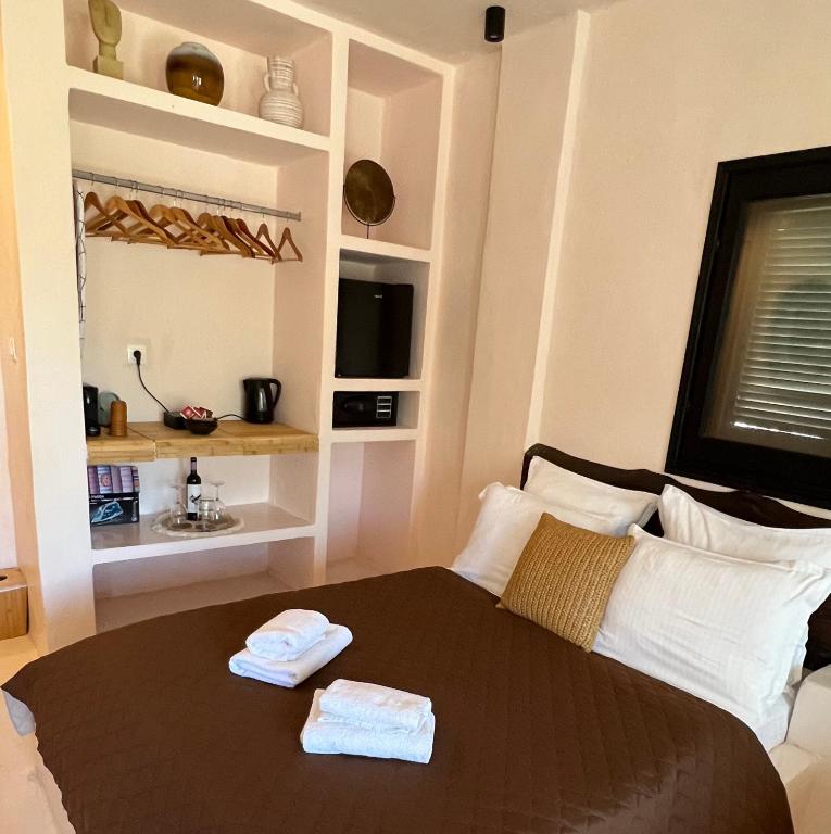 Postel nebo postele na pokoji v ubytování Kynthia Hotel - Adults Only