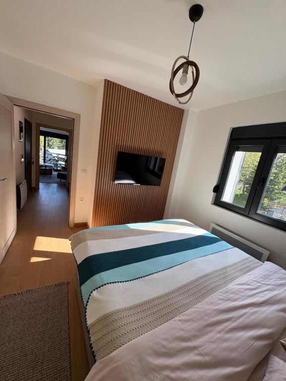 Postel nebo postele na pokoji v ubytování Villa Jezero 3
