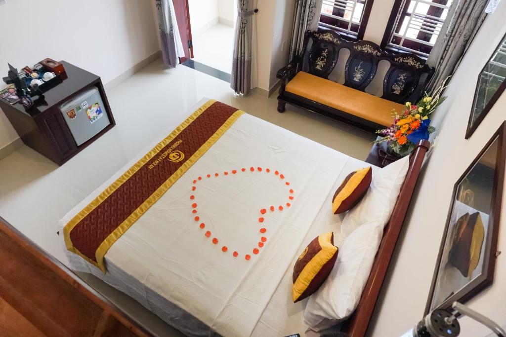 Postel nebo postele na pokoji v ubytování Phoenix Homestay