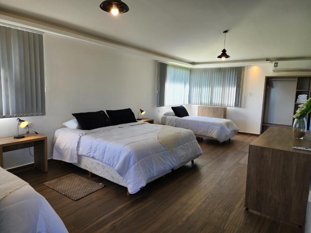 Postel nebo postele na pokoji v ubytování Irupé Lodge