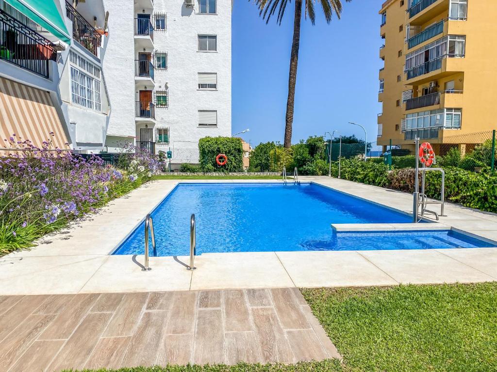 Bazén v ubytování Reformado apartamento en el centro con vista al mar nebo v jeho okolí