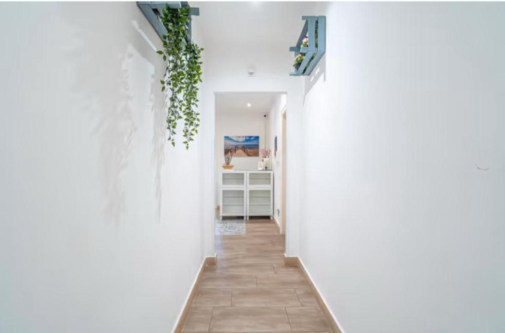 Postel nebo postele na pokoji v ubytování RAUDINO ROOMS