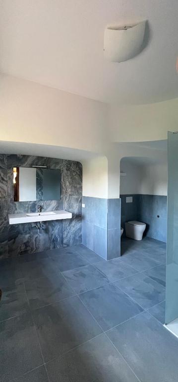 Fotografie z fotogalerie ubytování Bella Vita Guesthouse -parcheggio privato interno v destinaci Arona