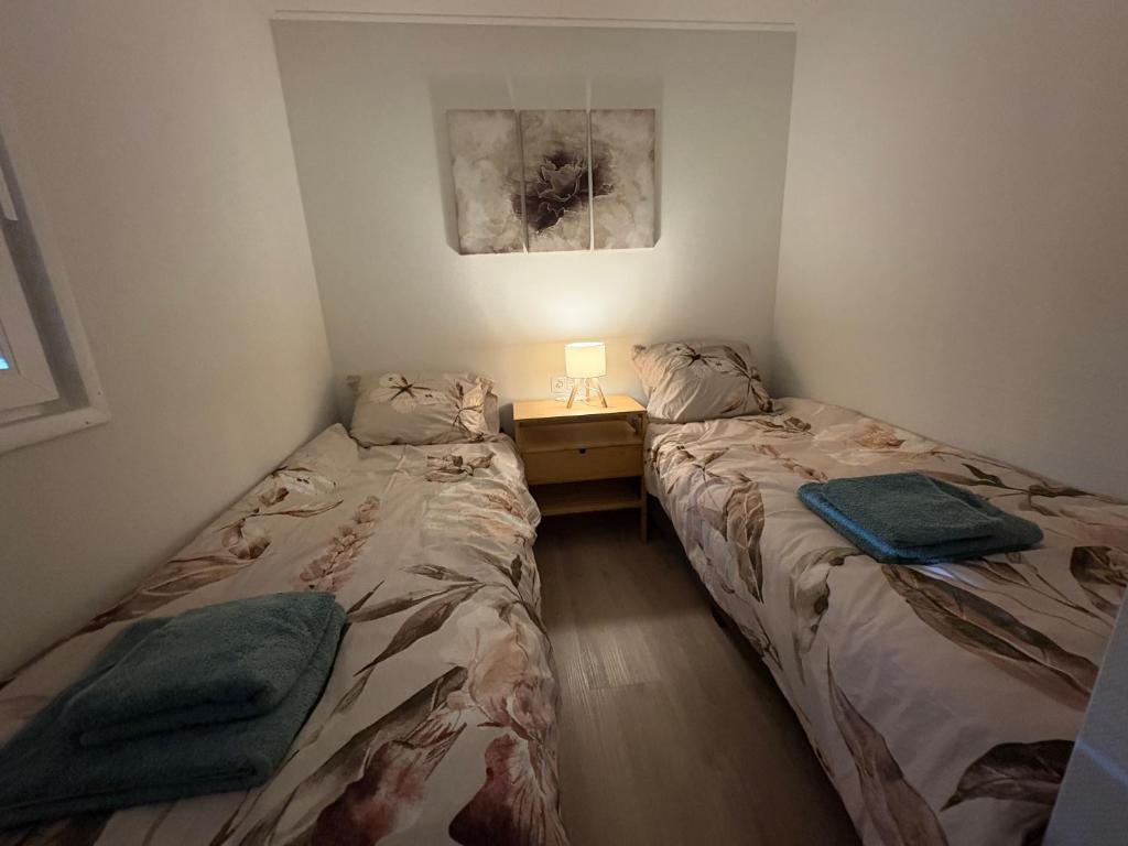 Postel nebo postele na pokoji v ubytování Chalet Vleugelvlucht