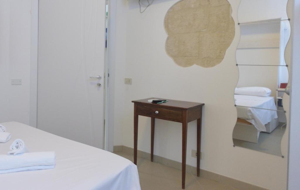 Postel nebo postele na pokoji v ubytování Casa Nannì