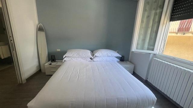 A bed or beds in a room at Casa Carlotta Lake Como