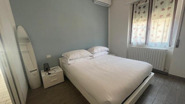 A bed or beds in a room at Casa Carlotta Lake Como