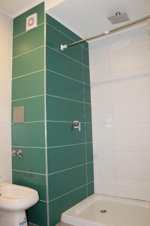 Koupelna v ubytování Nómade Hostel mdz