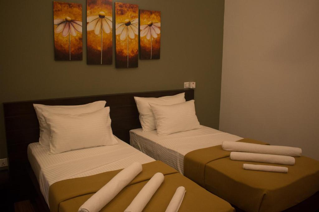Postel nebo postele na pokoji v ubytování The Suite 262