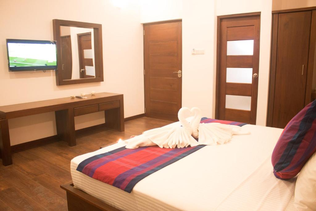 Postel nebo postele na pokoji v ubytování The Suite 262