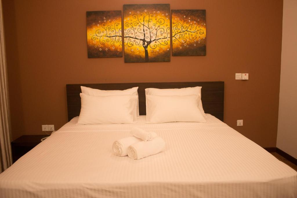 Postel nebo postele na pokoji v ubytování The Suite 262