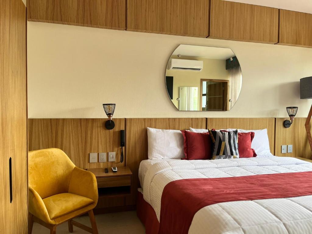 Postel nebo postele na pokoji v ubytování Hotel Cinco Diamantes