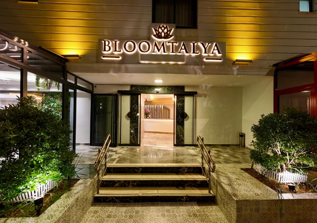 a building with stairs leading to the front door at Bloomtalya Hotel in Antalya