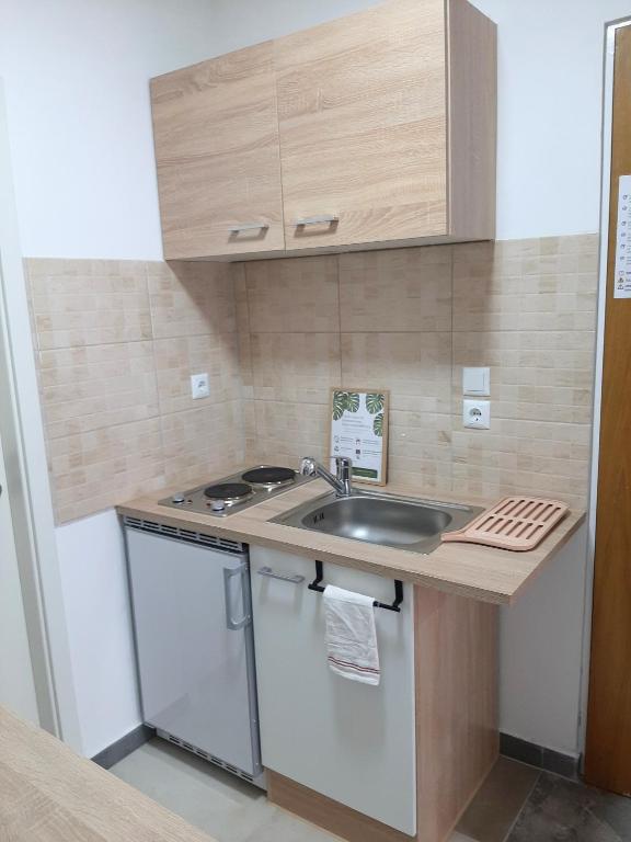 Kuchyň nebo kuchyňský kout v ubytování L'Échappée douce, central et lumineux