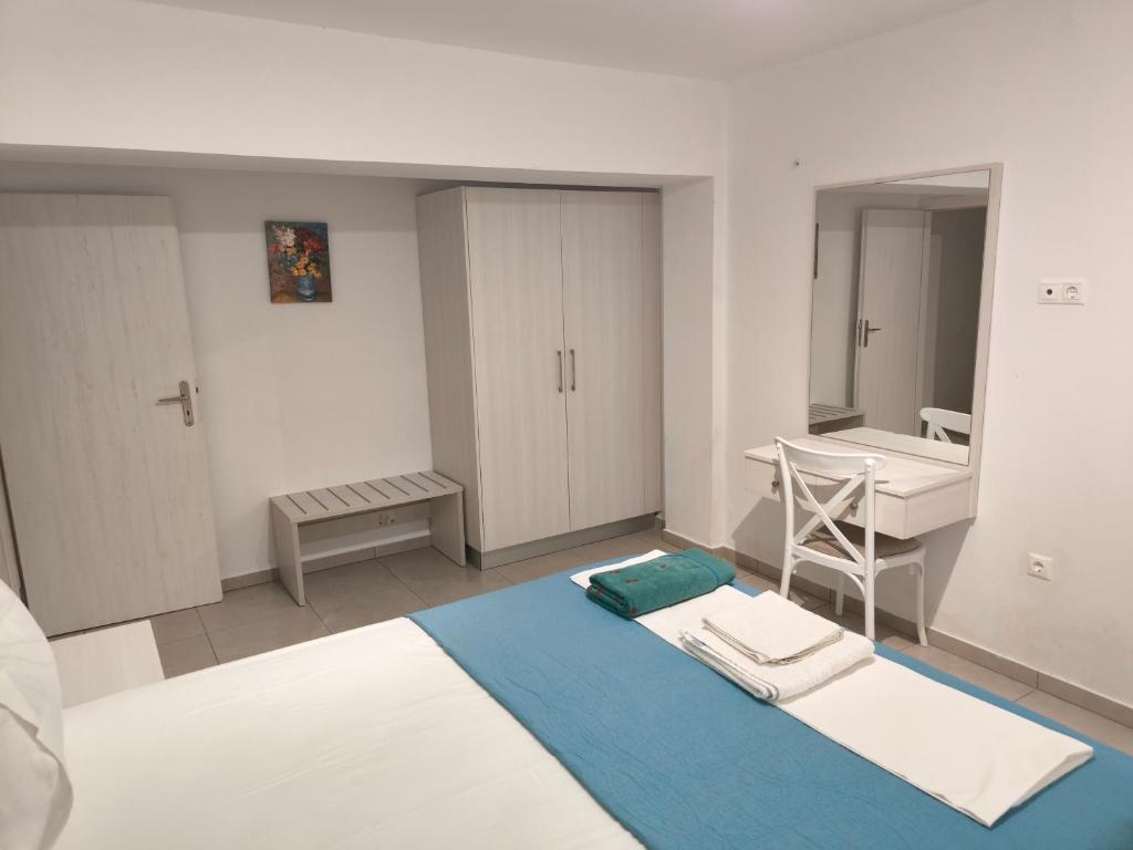 Postel nebo postele na pokoji v ubytování Alexia Rooms