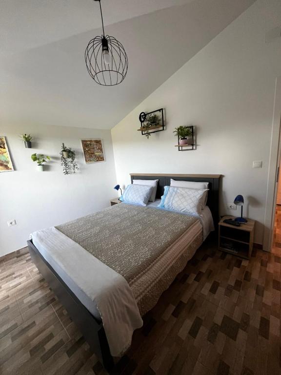 Posteľ alebo postele v izbe v ubytovaní Apartmani Mirko Rovinj