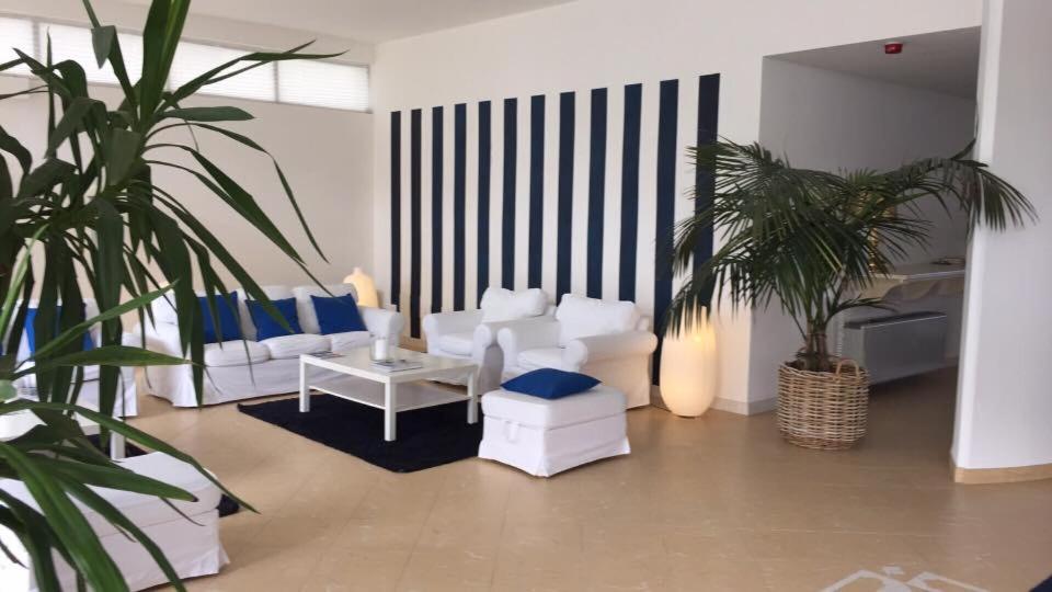 Posezení v ubytování Hotel Caravelle