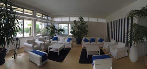 Posezení v ubytování Hotel Caravelle