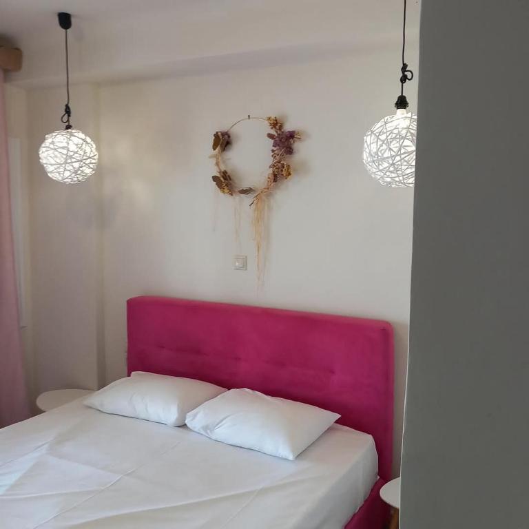 Postel nebo postele na pokoji v ubytování Hotel Assini Beach Tolo