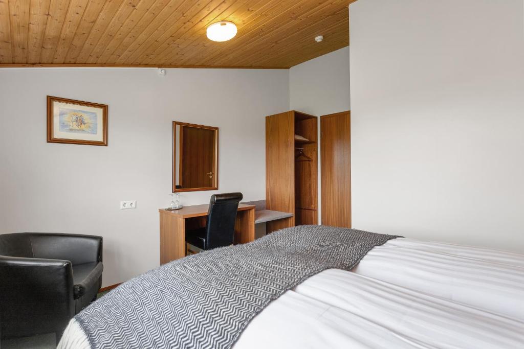 Letto o letti in una camera di Hestakráin Guesthouse