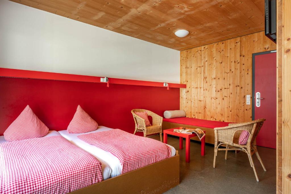 Postel nebo postele na pokoji v ubytování Base Aktivhotel Montafon