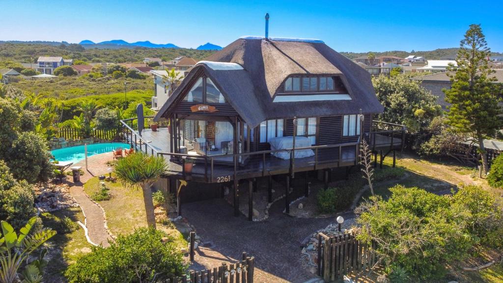 an aerial view of a house with a pool at Sea Breeze Apartment in Wilderness