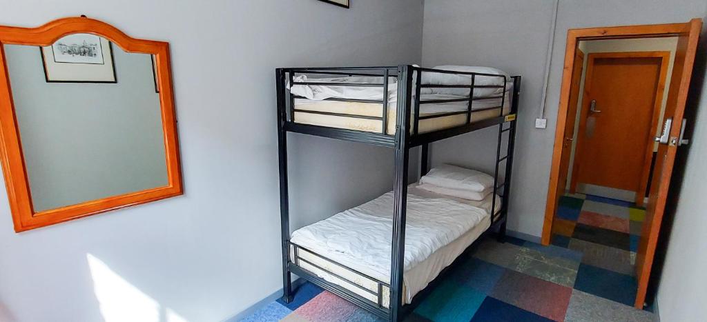 Postel nebo postele na pokoji v ubytování R S Hostels - Leeds
