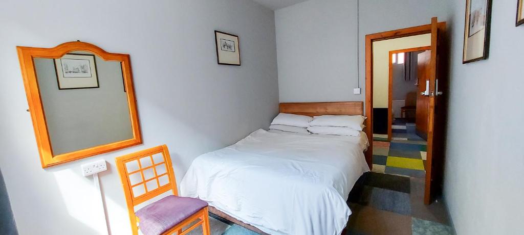 Postel nebo postele na pokoji v ubytování R S Hostels - Leeds