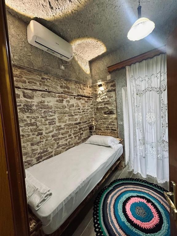 Postel nebo postele na pokoji v ubytování Lengo Guest House