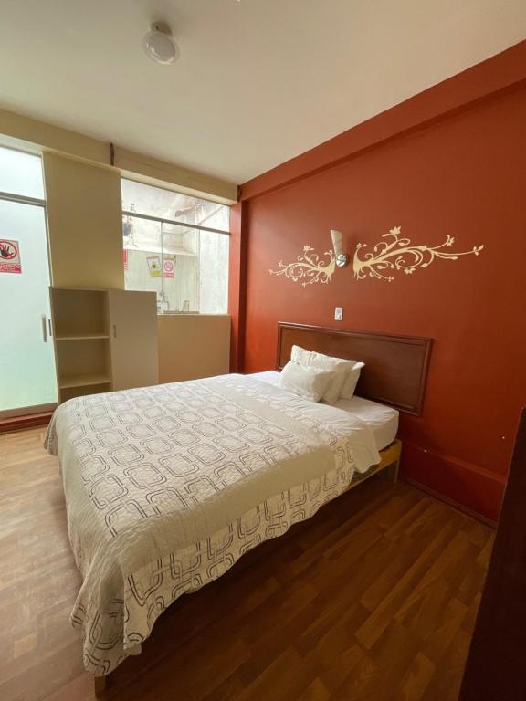 Postel nebo postele na pokoji v ubytování Hotel Andean Host Inn