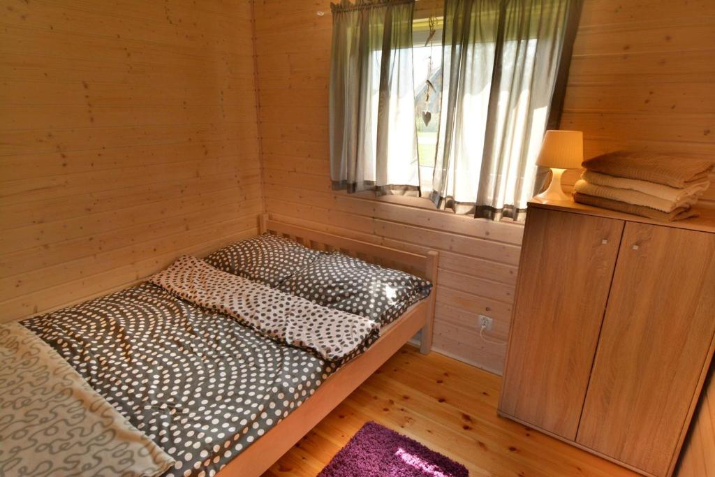 Postel nebo postele na pokoji v ubytování Ośrodek Wypoczynkowy Lawendowo