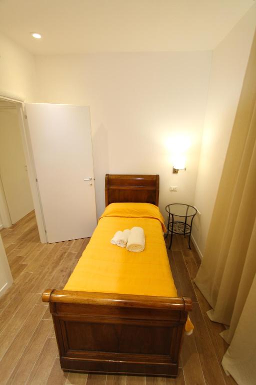 Posteľ alebo postele v izbe v ubytovaní Corte Spagnola