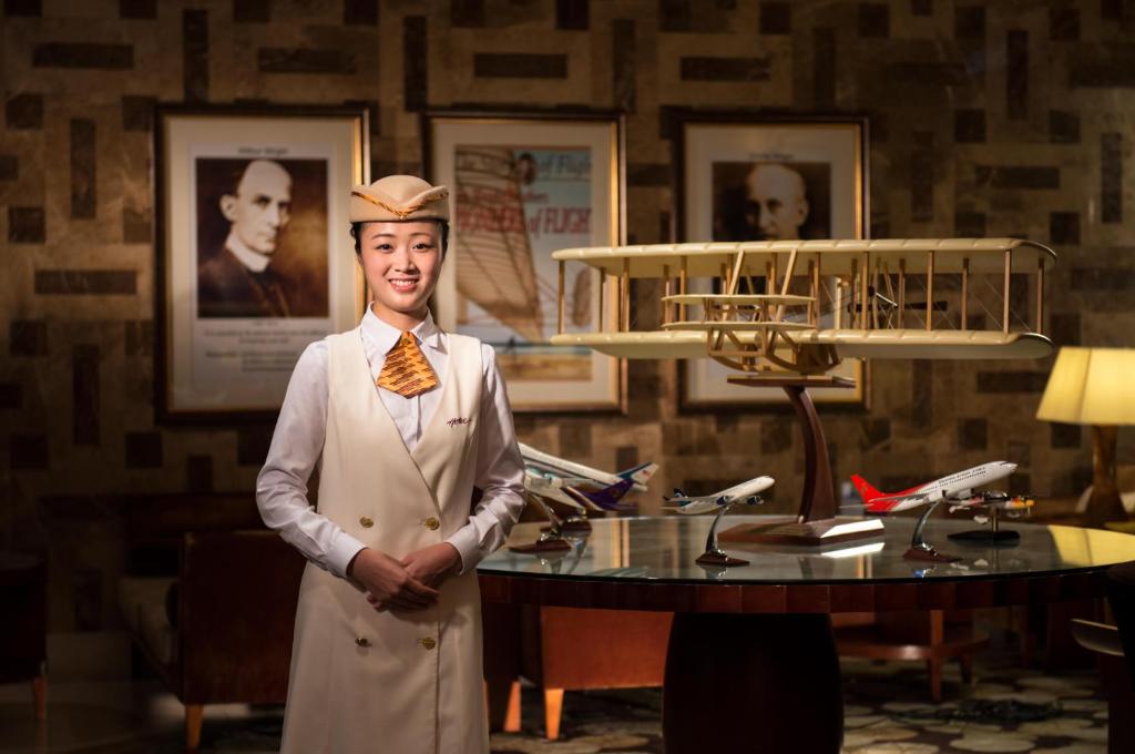 Členové personálu v ubytování Shenzhenair International Hotel