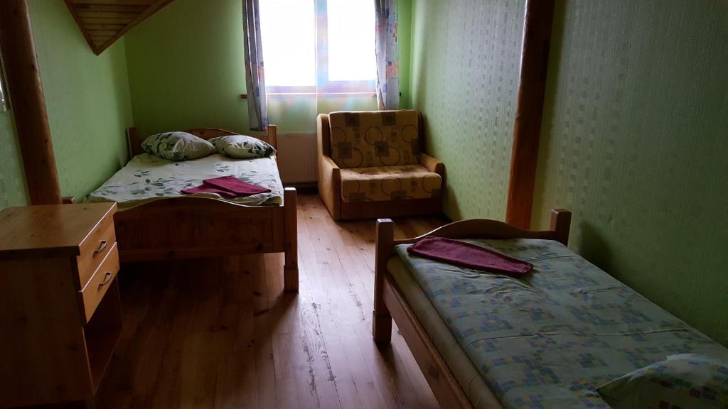 Postel nebo postele na pokoji v ubytování Apelsīns