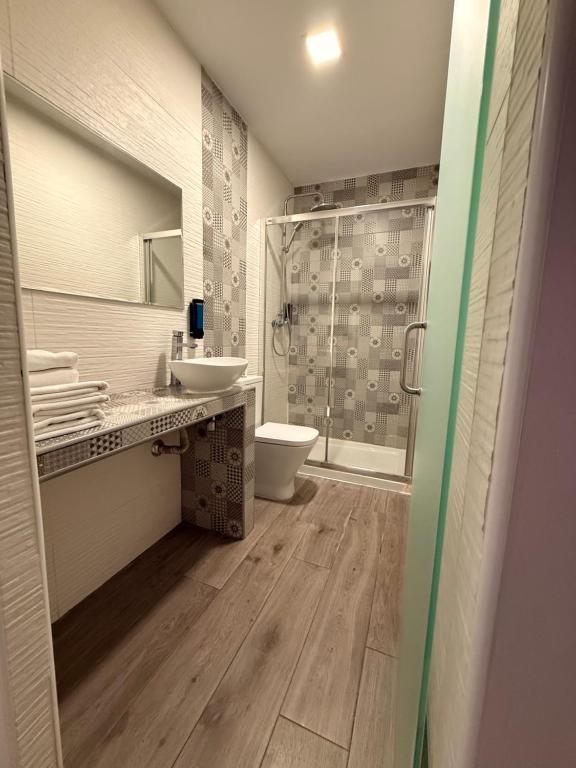 Kúpeľňa v ubytovaní HOSTAL LETTO DAL MARE