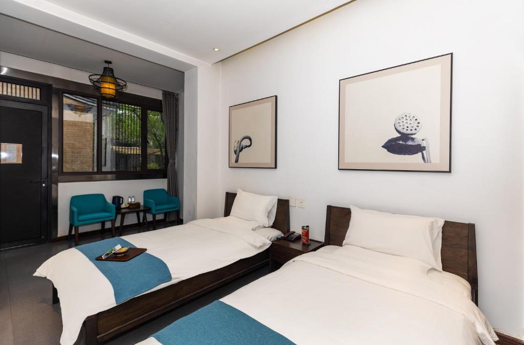 Elsewhere Hotel Inn North Street Branch客房内的一张或多张床位