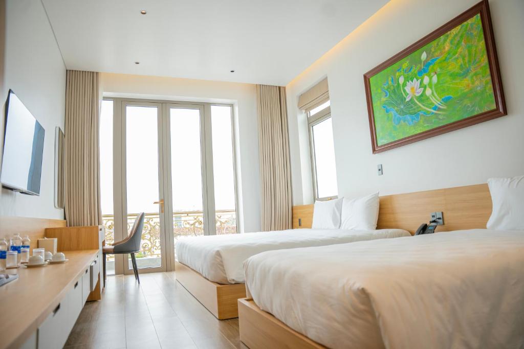 TV a/nebo společenská místnost v ubytování Min Min Hotel