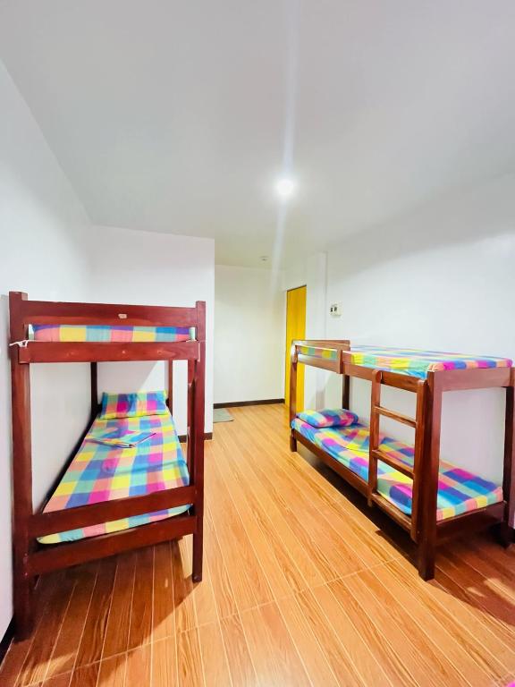 Postel nebo postele na pokoji v ubytování Tres Marias Place