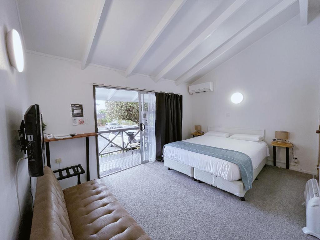 Postel nebo postele na pokoji v ubytování Siesta Motel
