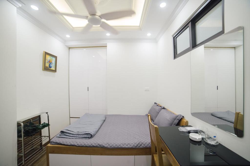 Postel nebo postele na pokoji v ubytování Pho Nang Hotel